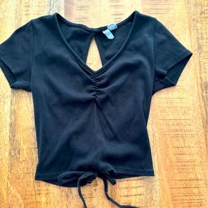 Black, V-neck. Open back top. Size M
